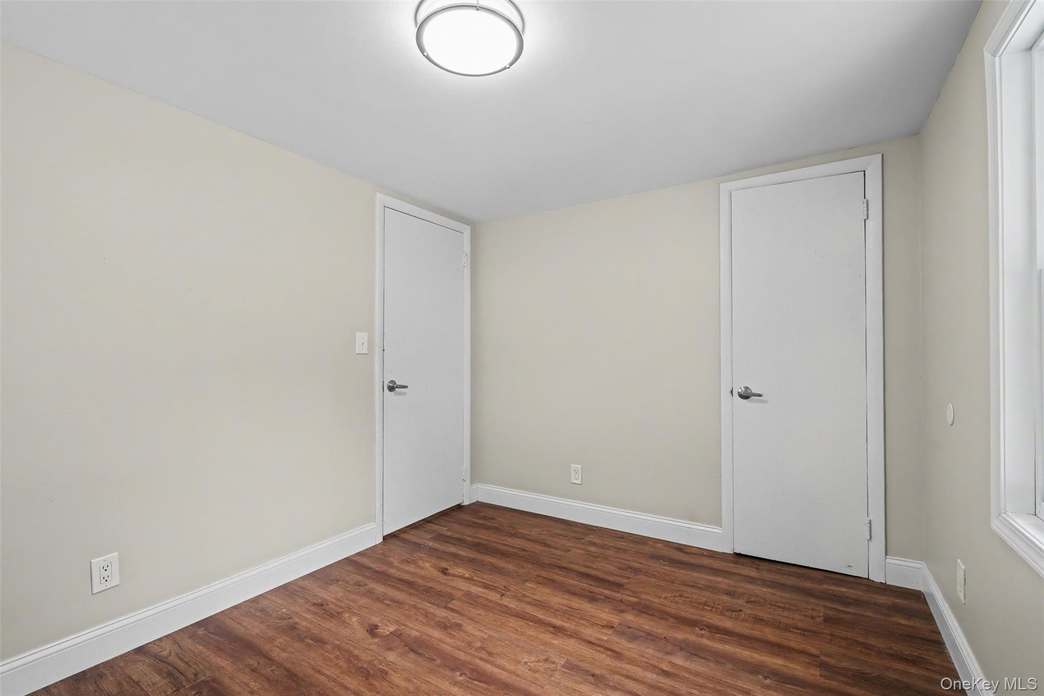 108 Pine Hill Road Chester, NY 10918 - Photo 25 of 37 a view of an empty room with wooden floor