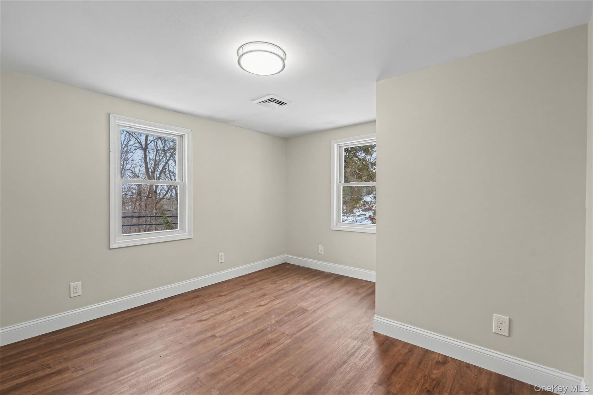108 Pine Hill Road Chester, NY 10918 - Photo 26 of 37 wooden floor in an empty room with a window