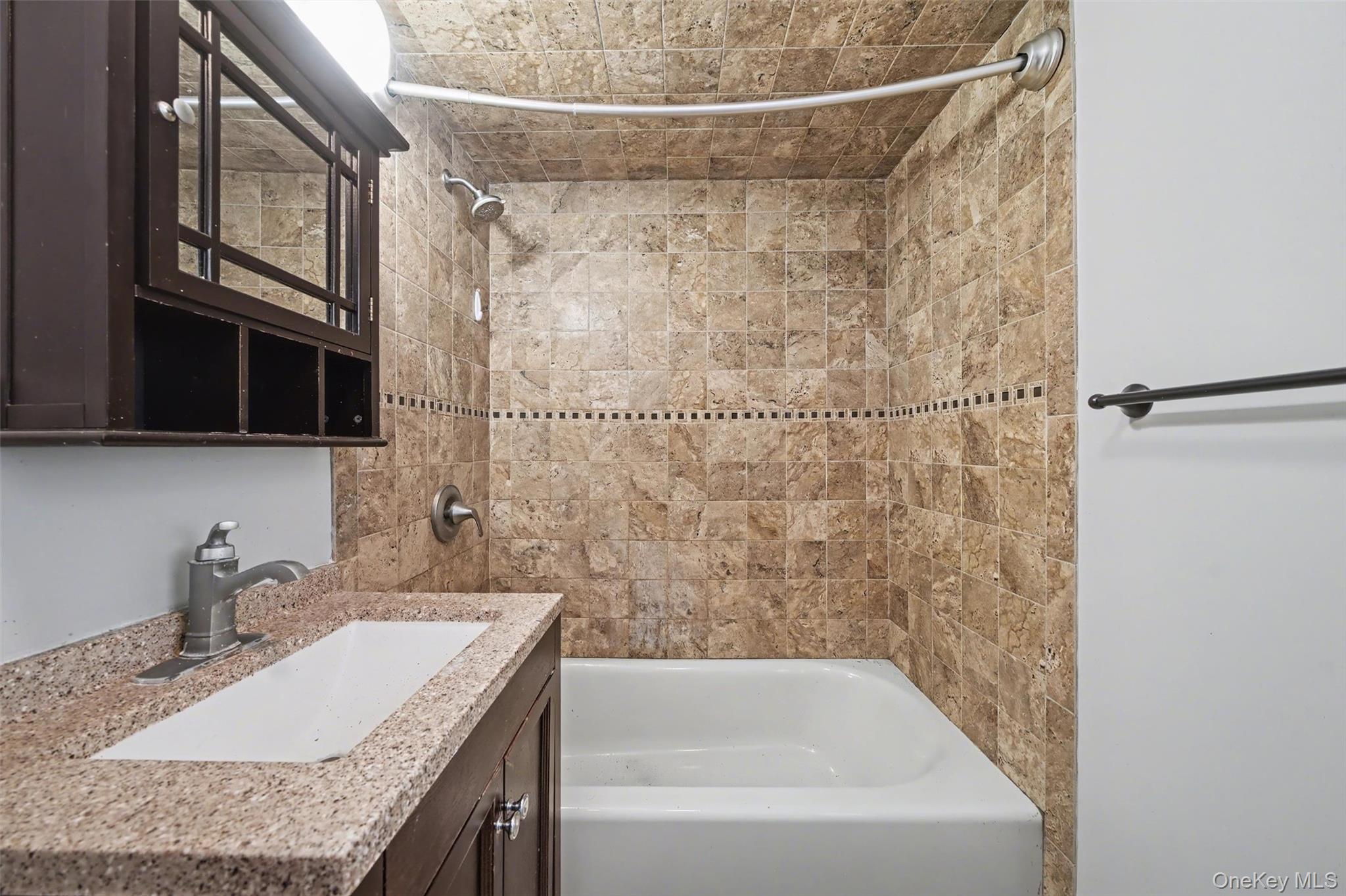 108 Pine Hill Road Chester, NY 10918 - Photo 29 of 37 a bathroom with a granite countertop sink a mirror and shower