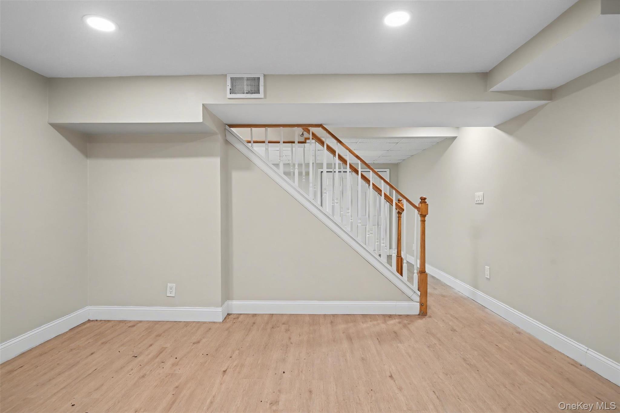 108 Pine Hill Road Chester, NY 10918 - Photo 31 of 37 a view of an empty room with stairs and a window