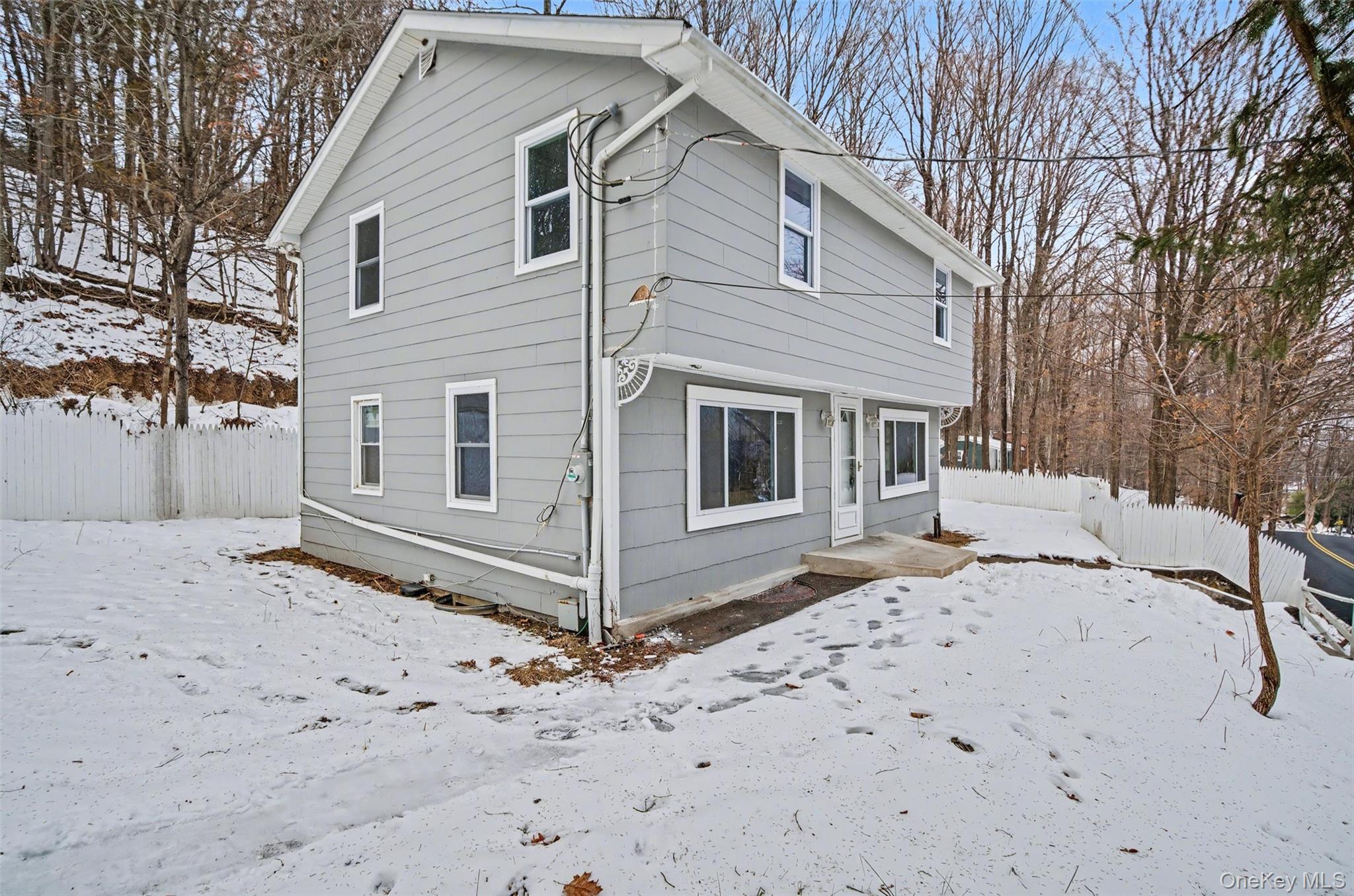 108 Pine Hill Road Chester, NY 10918 - Photo 5 of 37 a view of a house with a snow on the road