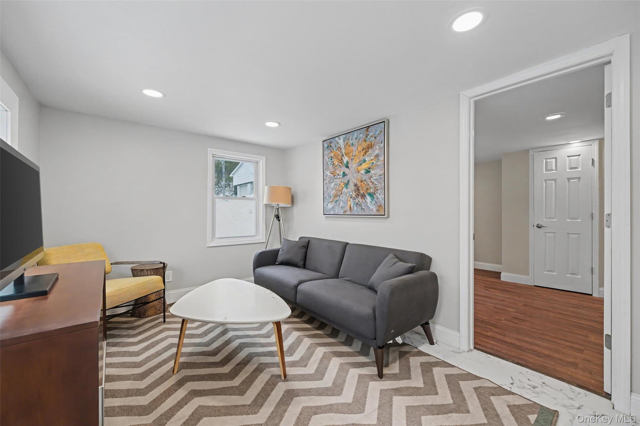 108 Pine Hill Road Chester, NY 10918 - Photo 7 of 37 a living room with furniture and a flat screen tv