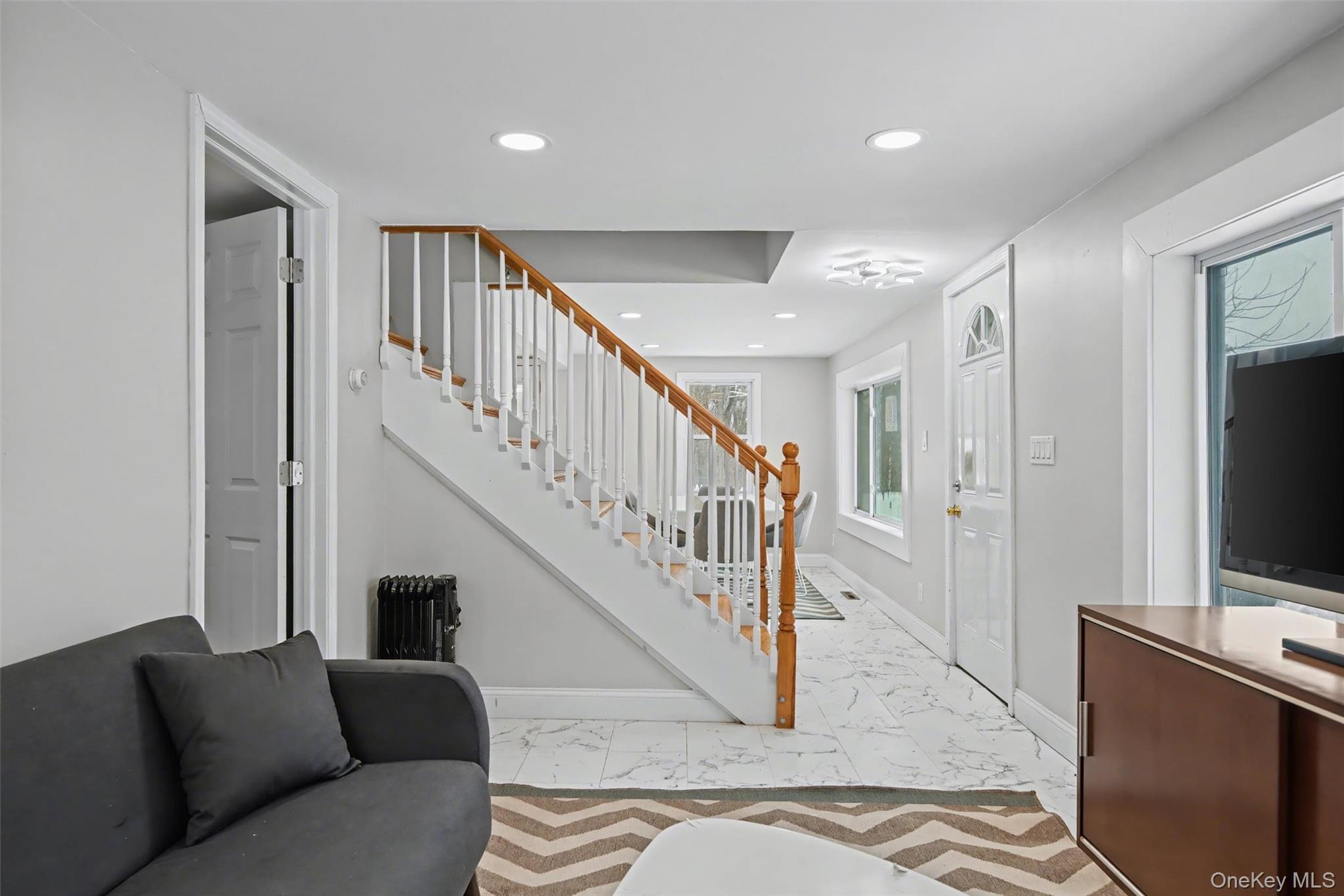 108 Pine Hill Road Chester, NY 10918 - Photo 9 of 37 a living room with furniture and a flat screen tv
