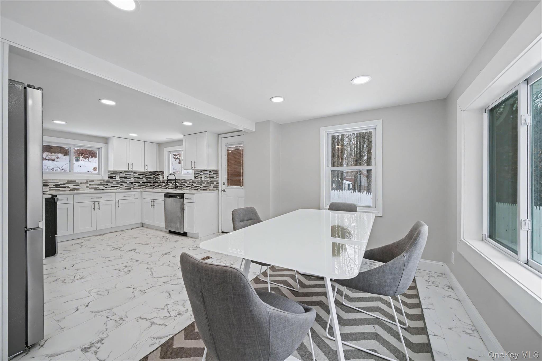 108 Pine Hill Road Chester, NY 10918 - Photo 10 of 37 a view of a dining room with furniture and wooden floor