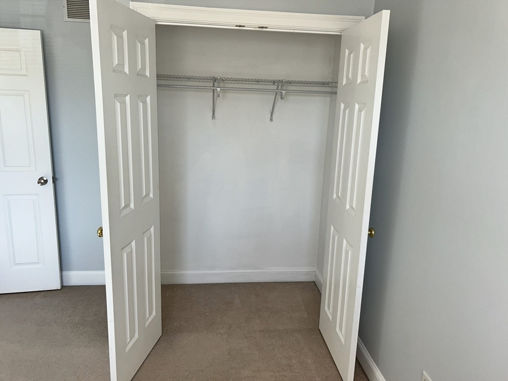 1975 Middlesex Street, Unit 10 Lowell, MA 01851 - Photo 13 of 21 a view of a room with door