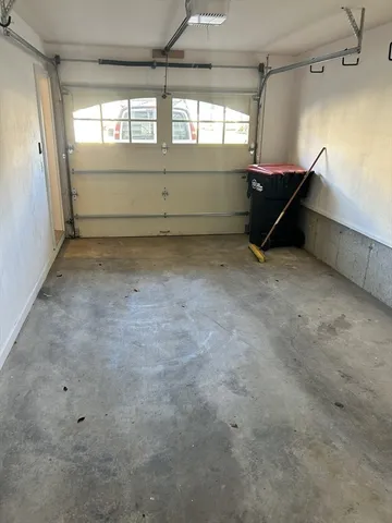 a view of staircase with white walls