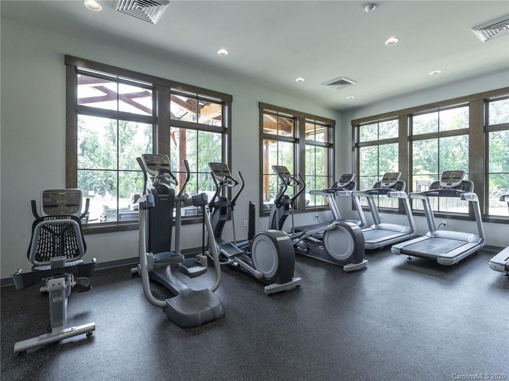 6201 Six String Court Fort Mill, SC 29708 - Photo 5 of 10 a room with gym equipment and large windows