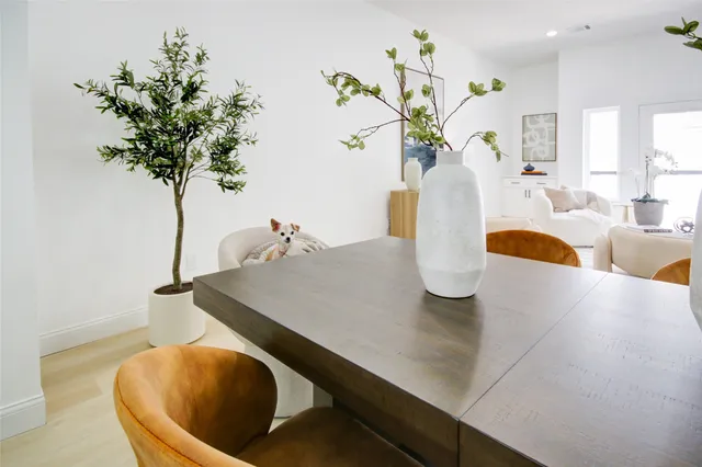 a vase of flowers sitting on a table
