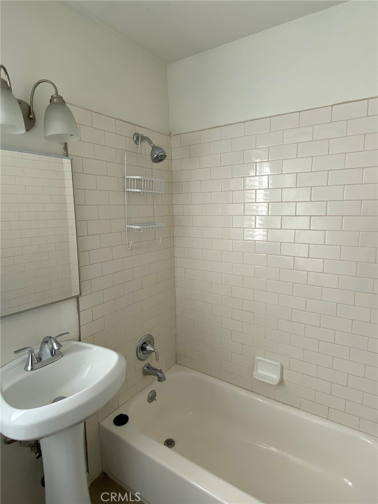 1124 Cordova Street, Unit 1 Pasadena, CA 91106 - Photo 8 of 8 a bathroom with a sink a toilet and shower