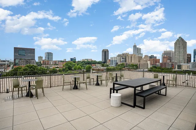a view of roof deck with patio