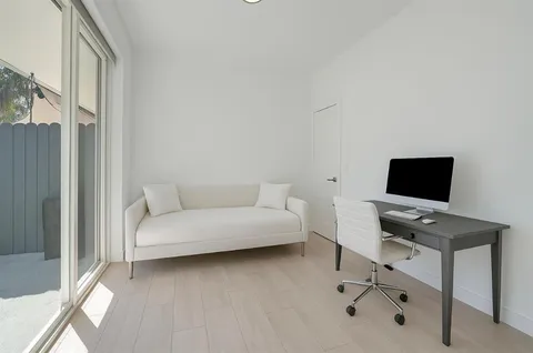 a view of a workspace with a bathroom