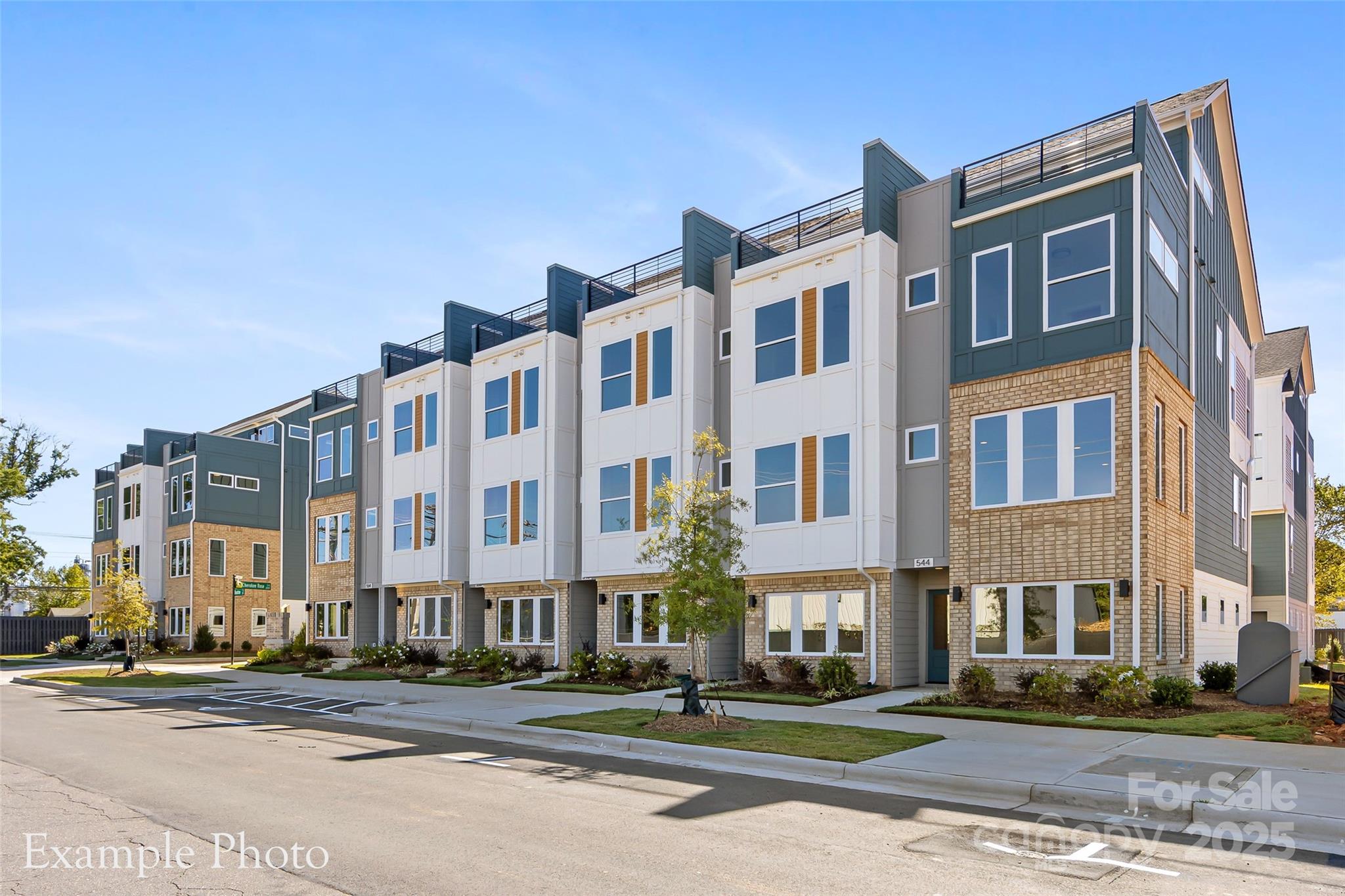 548 Rountree Road, Unit 9 Charlotte, NC 28217 - Photo 2 of 36 a front view of a building with street view
