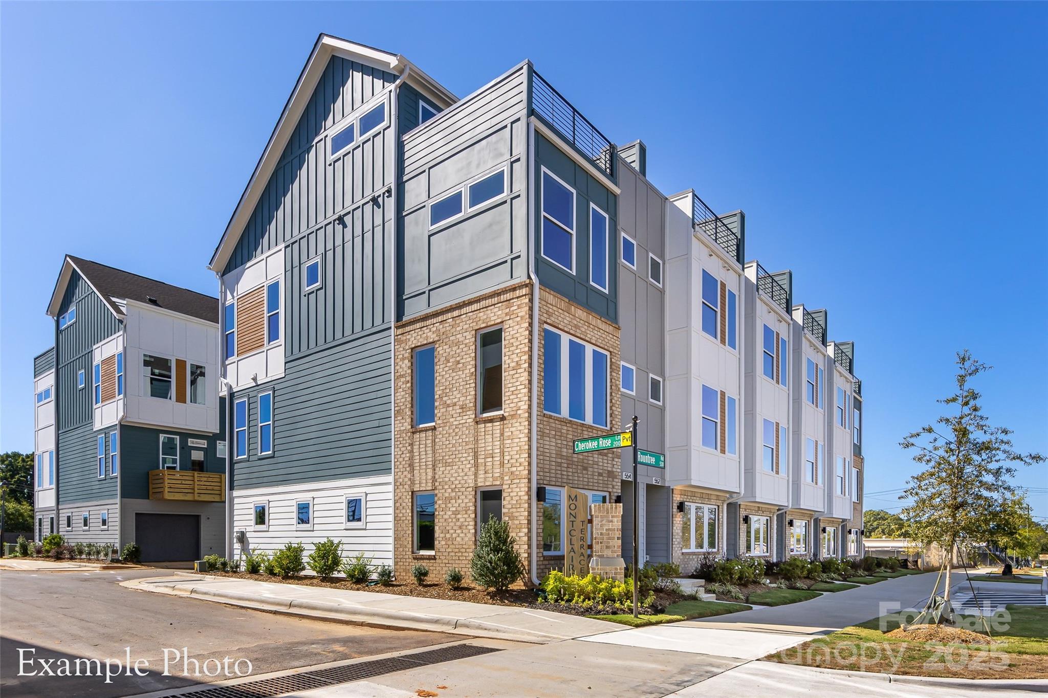 548 Rountree Road, Unit 9 Charlotte, NC 28217 - Photo 3 of 36 a view of a building with a street