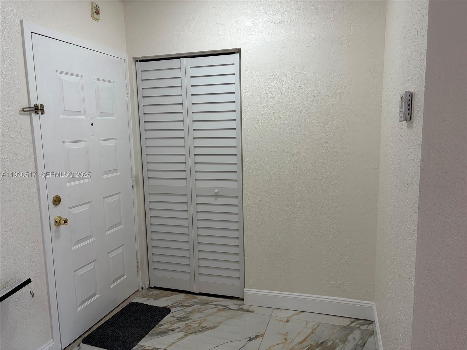 5550 Northwest 44th Street, Unit 414B Lauderhill, FL 33319 - Photo 14 of 17 a view of closet