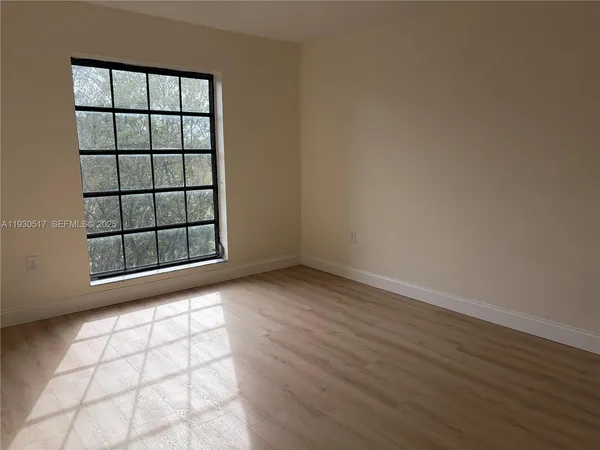 an empty room with windows