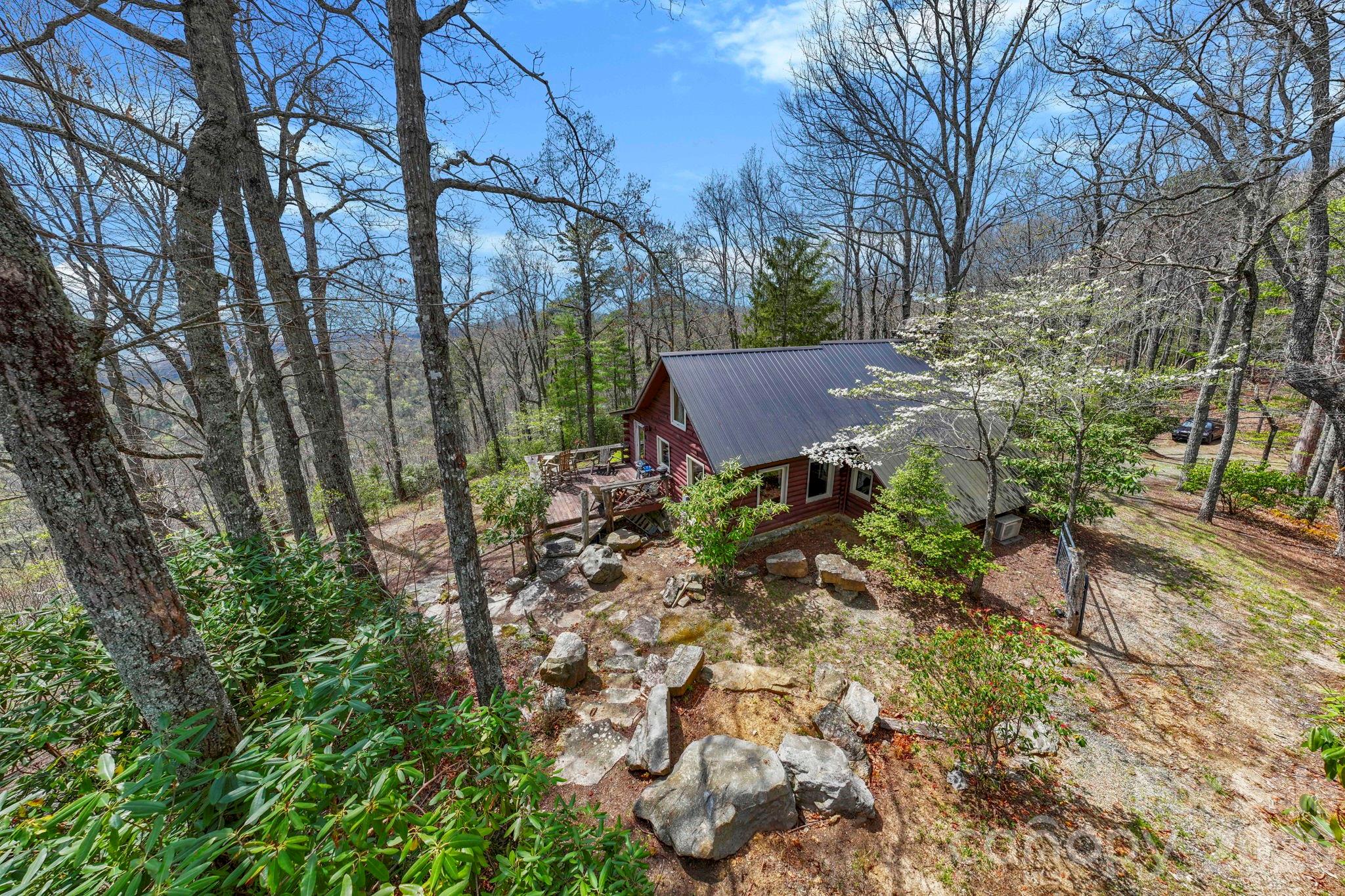 305 Stamey Creek Road Brevard, NC 28712 - Photo 7 of 32 a view of a house with a yard