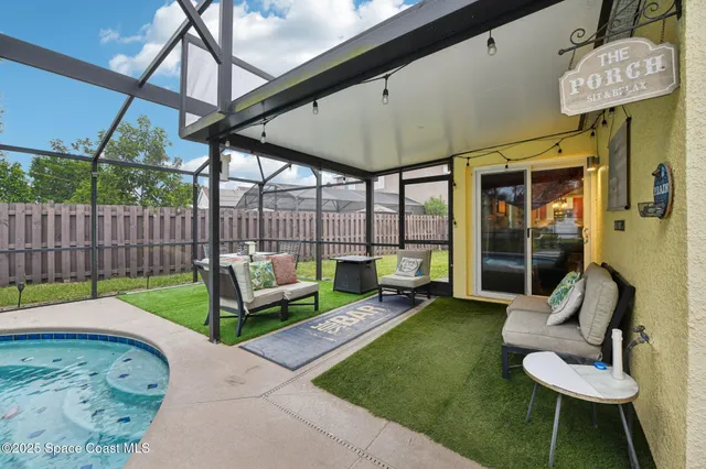 a view of a chairs and tables in the patio
