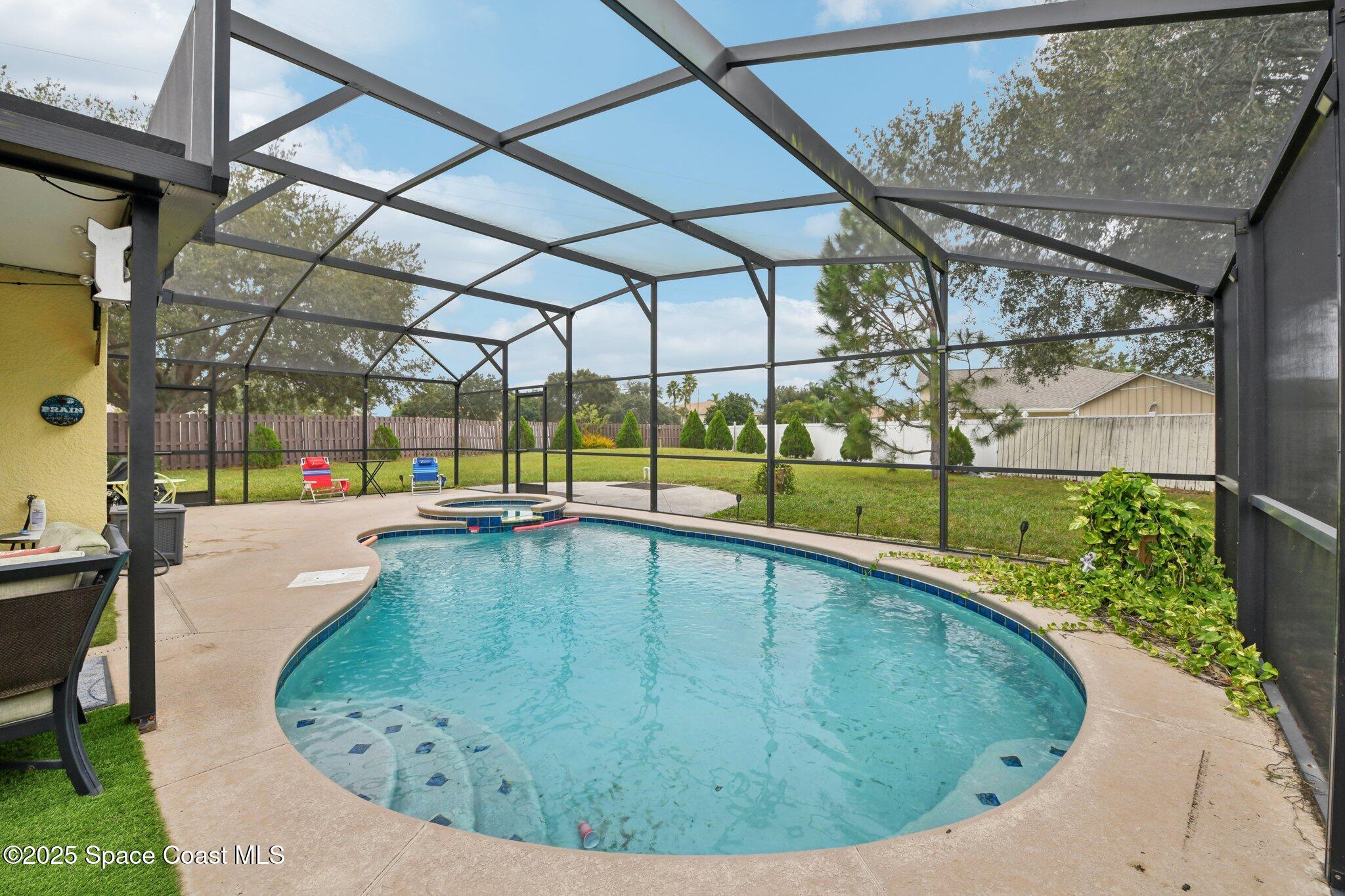 1125 Carey Glen Circle Orlando, FL 32824 - Photo 24 of 31 a view of swimming pool