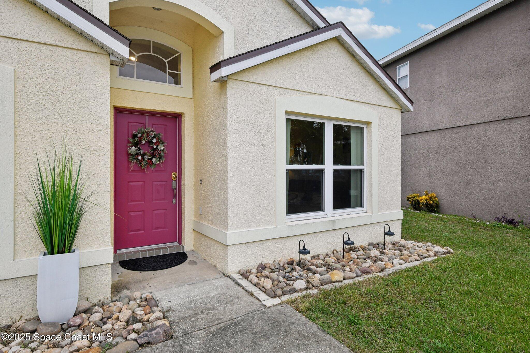 1125 Carey Glen Circle Orlando, FL 32824 - Photo 27 of 31 front door