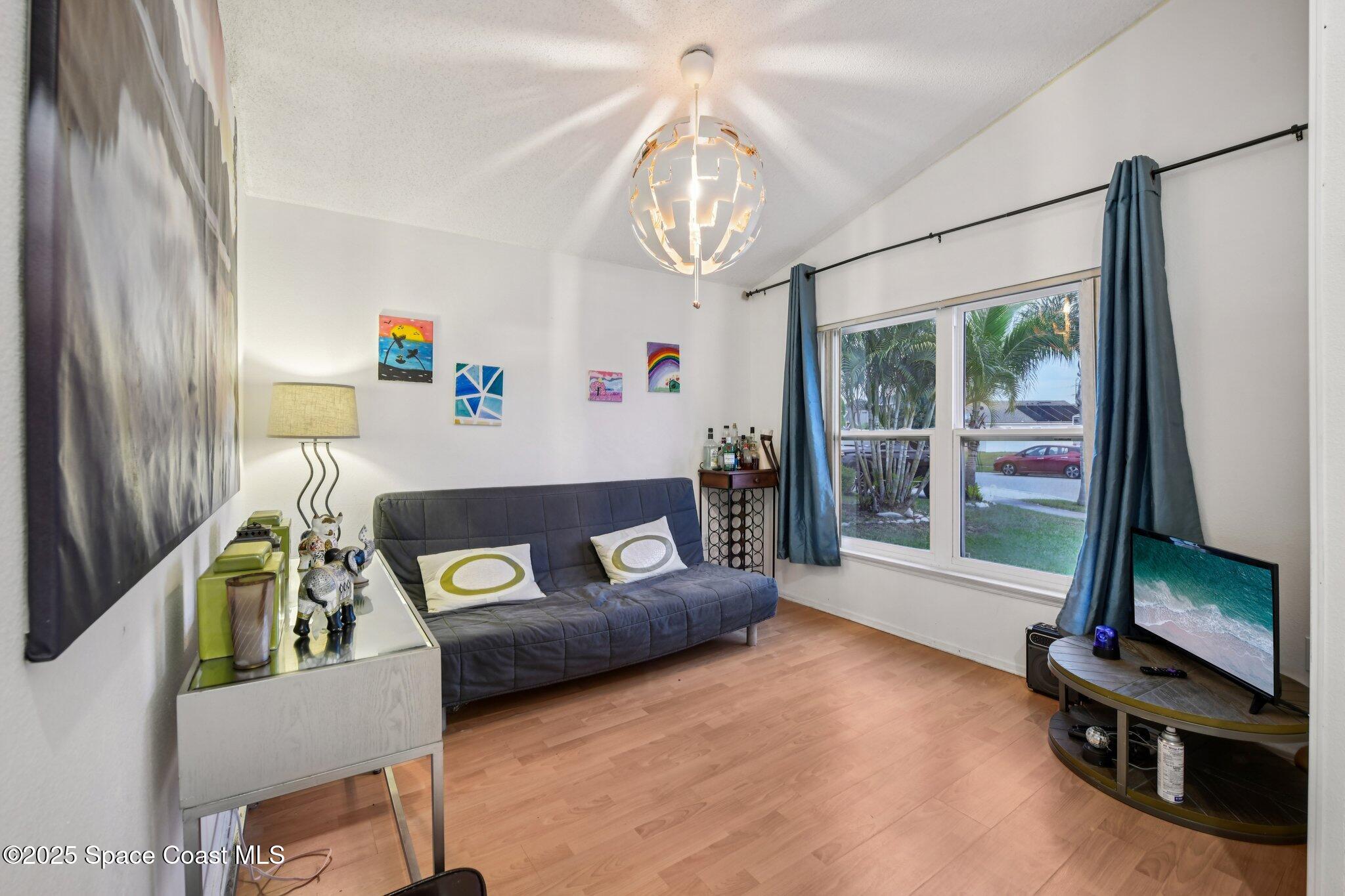 1125 Carey Glen Circle Orlando, FL 32824 - Photo 3 of 31 Den at entrance