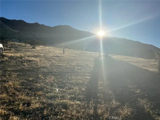 a view of a lake with a mountain in the background