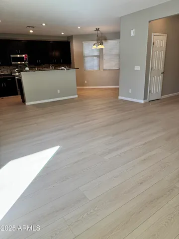 a view of a kitchen with a sink