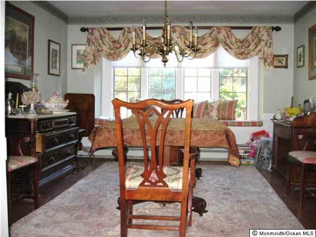 2616 River Road Manasquan, NJ 08736 - Photo 3 of 9 a view of a dining room with furniture window and outside view