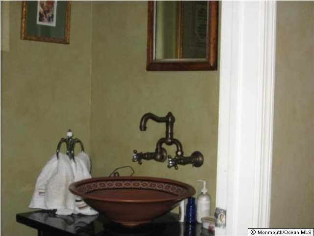 2616 River Road Manasquan, NJ 08736 - Photo 4 of 9 a bathroom with a sink