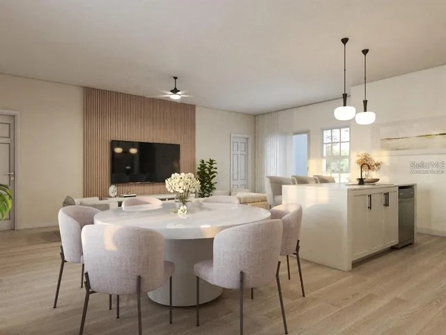 a dining room with furniture and window