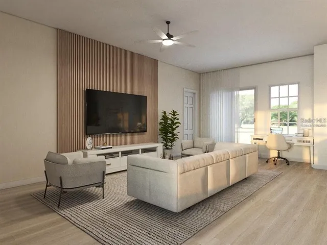 a living room with furniture and a flat screen tv