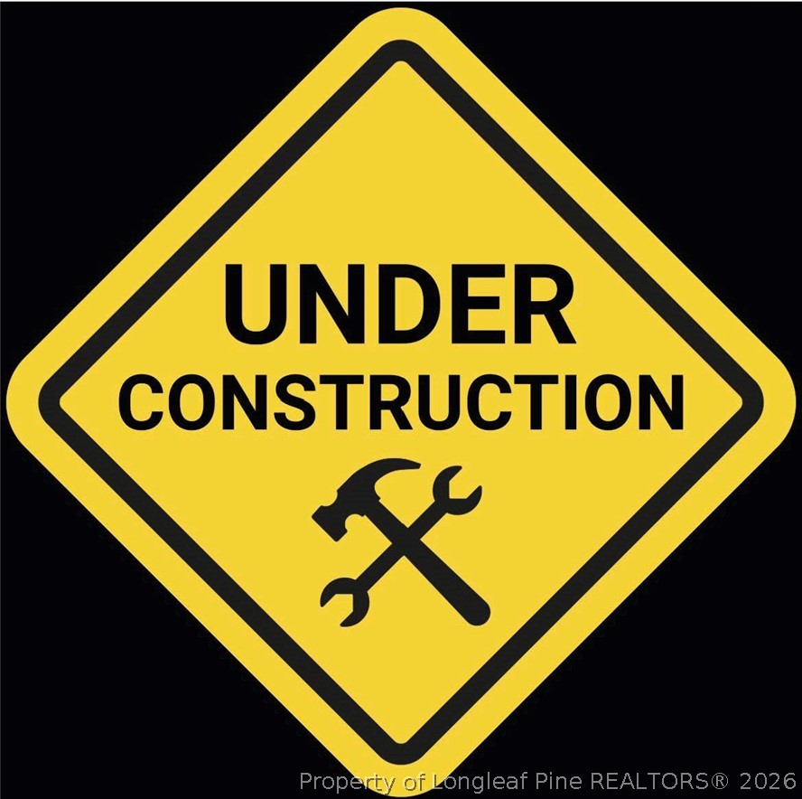 3987 Blue Springs Road Red Springs, NC 28377 - Photo 3 of 3 a sign broad on wooden wall