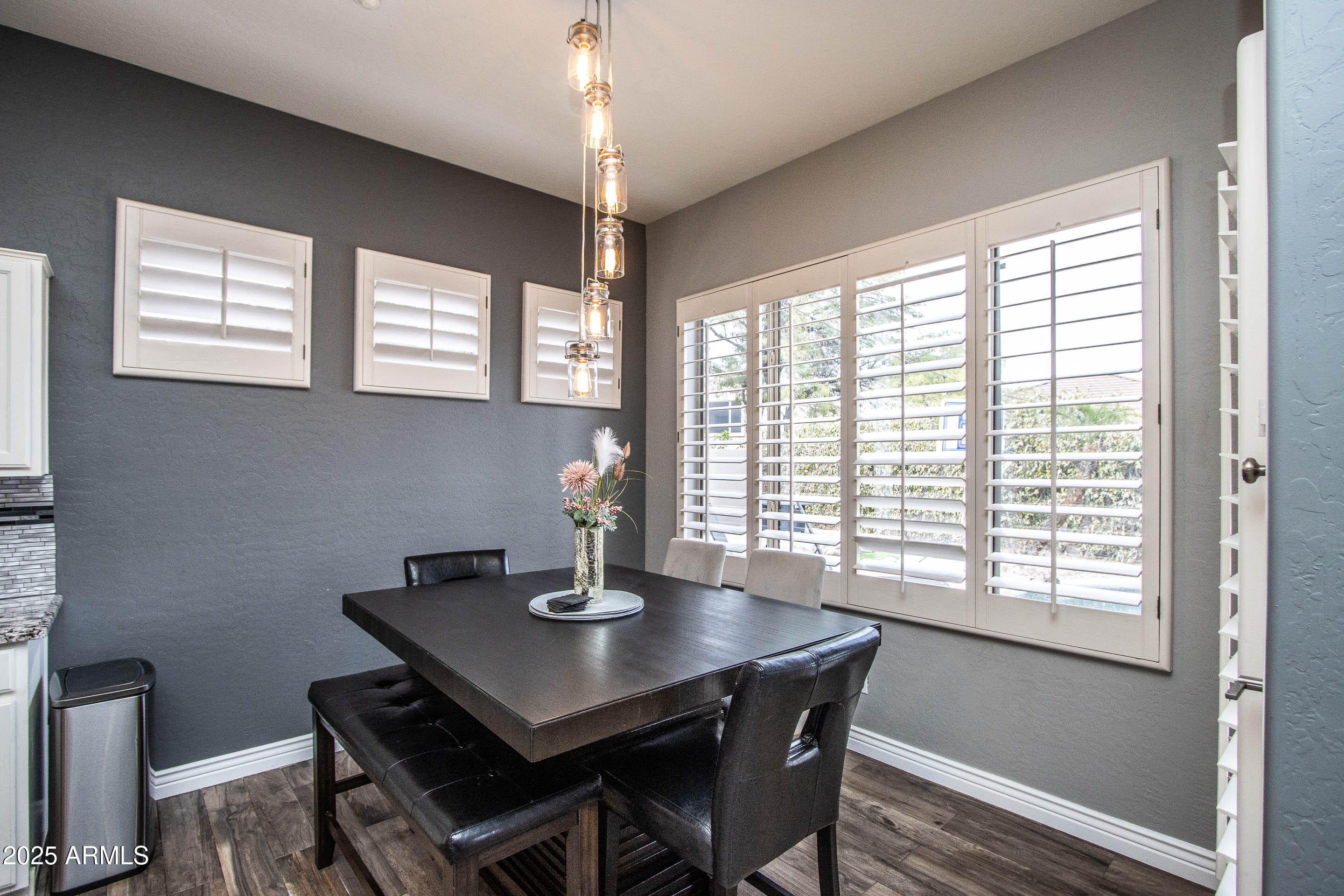 10412 East Acoma Drive Scottsdale, AZ 85255 - Photo 8 of 21 a view of a dining room with furniture window and outside view