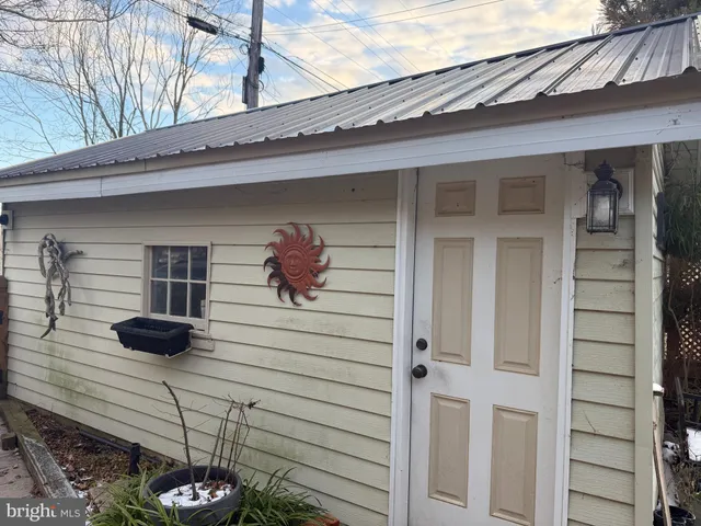 a view of a porch with a door