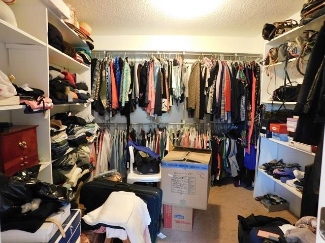 1241 Zenith Mill Road Roberta, GA 31078 - Photo 11 of 31 a view of walk in closet with clothes and shoes