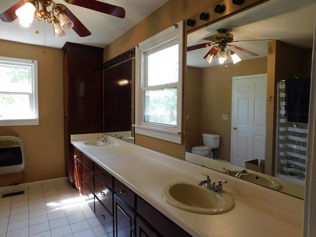 1241 Zenith Mill Road Roberta, GA 31078 - Photo 12 of 31 a bathroom with a sink double vanity and a mirror