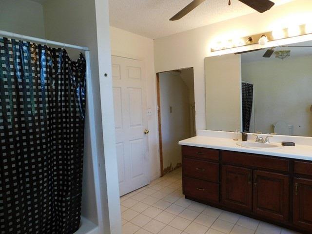 1241 Zenith Mill Road Roberta, GA 31078 - Photo 19 of 31 a bathroom with a double vanity sink and mirror
