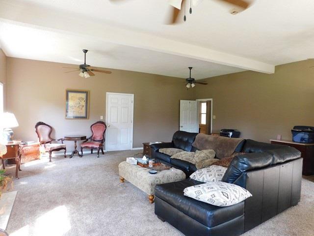 1241 Zenith Mill Road Roberta, GA 31078 - Photo 3 of 31 a living room with furniture and wooden floor