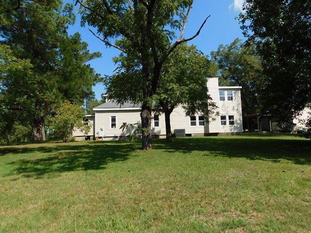 1241 Zenith Mill Road Roberta, GA 31078 - Photo 28 of 31 a view of a house with a yard