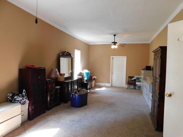 1241 Zenith Mill Road Roberta, GA 31078 - Photo 9 of 31 a view of a workspace with furniture and a gate