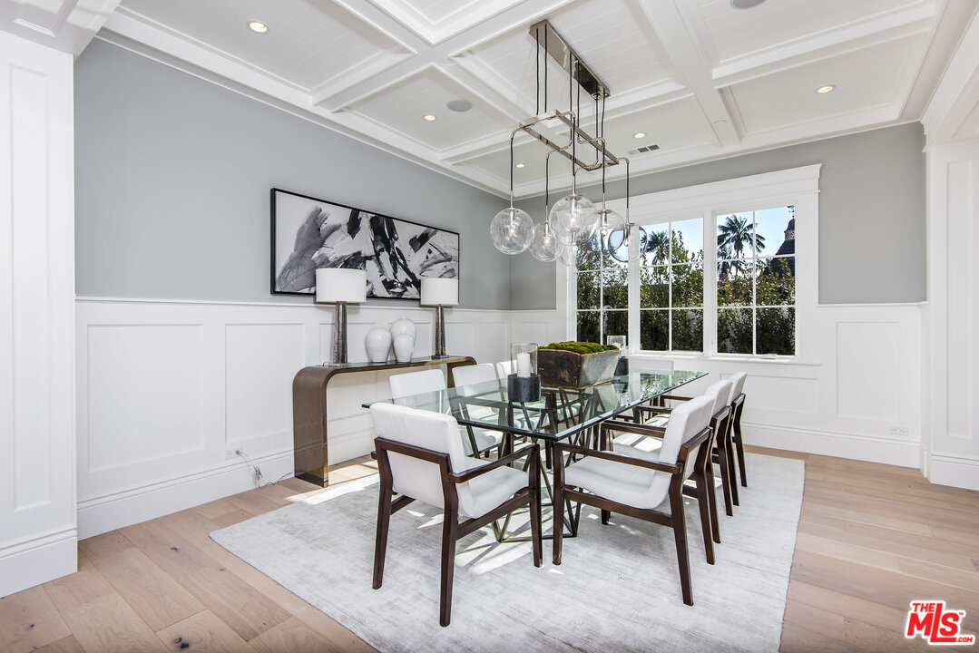107 Larkin Place Santa Monica, CA 90402 - Photo 12 of 51 a view of a dining room with furniture window and wooden floor