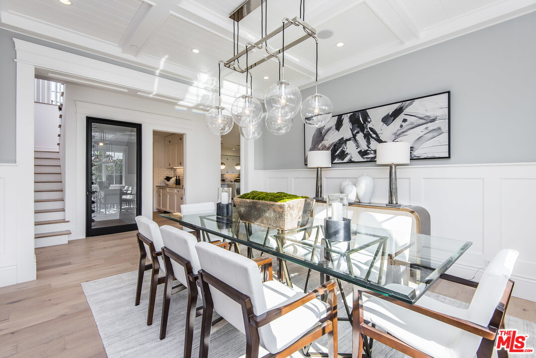 107 Larkin Place Santa Monica, CA 90402 - Photo 13 of 51 a view of a dining room with furniture and wooden floor