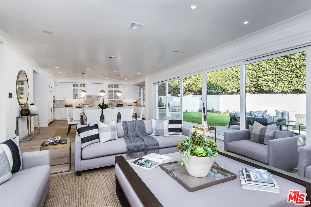 107 Larkin Place Santa Monica, CA 90402 - Photo 24 of 51 a living room with furniture and a large window