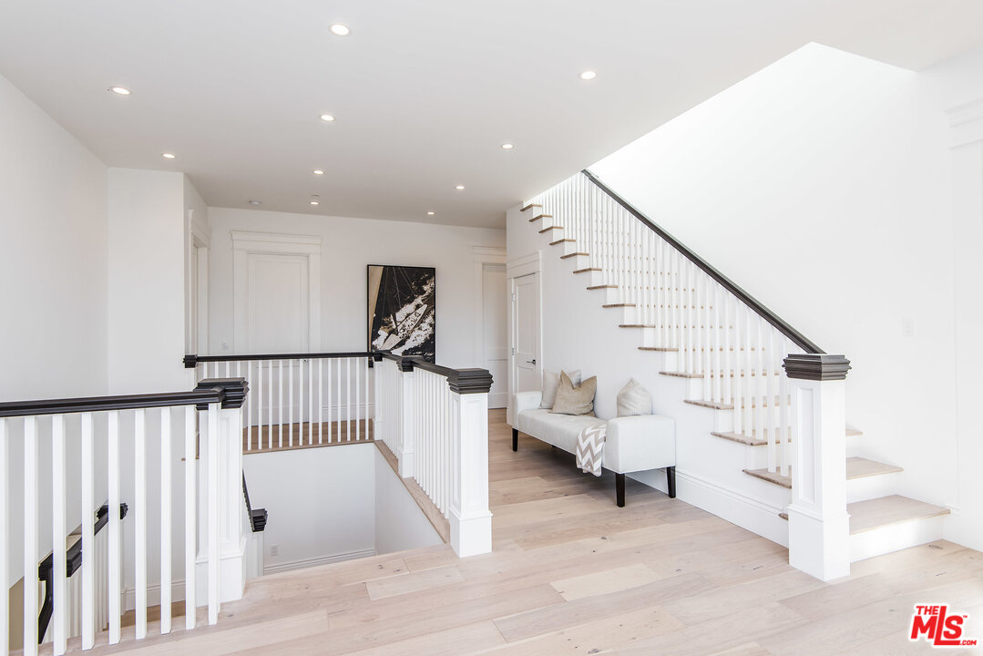 107 Larkin Place Santa Monica, CA 90402 - Photo 28 of 51 a view of staircase with white walls and white walls