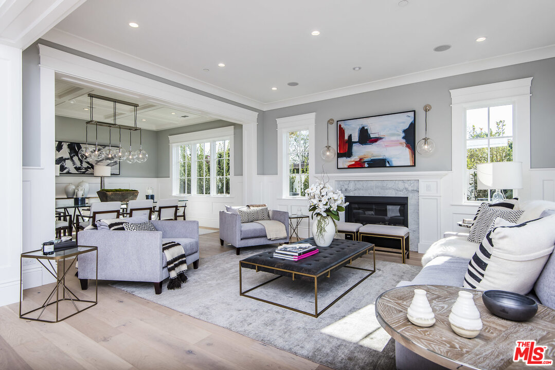 107 Larkin Place Santa Monica, CA 90402 - Photo 10 of 51 a living room with furniture and a fireplace