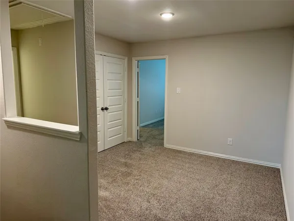 an empty room with closet
