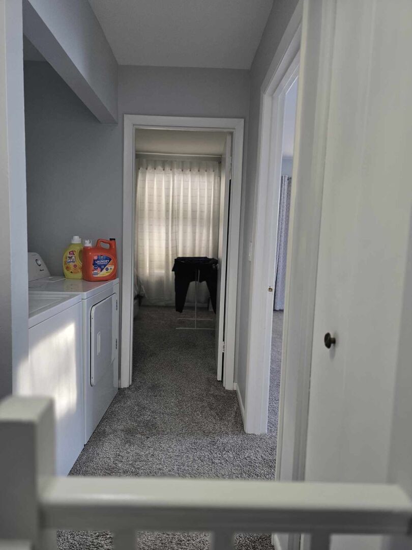 877 Wellington Avenue, Unit 1 Elk Grove Village, IL 60007 - Photo 16 of 25 a view of a bedroom that has a bed and a window