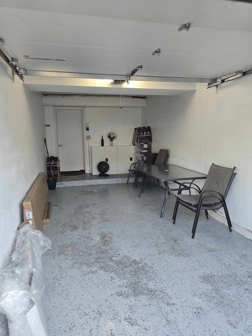 877 Wellington Avenue, Unit 1 Elk Grove Village, IL 60007 - Photo 22 of 25 a view of a room with gym equipment