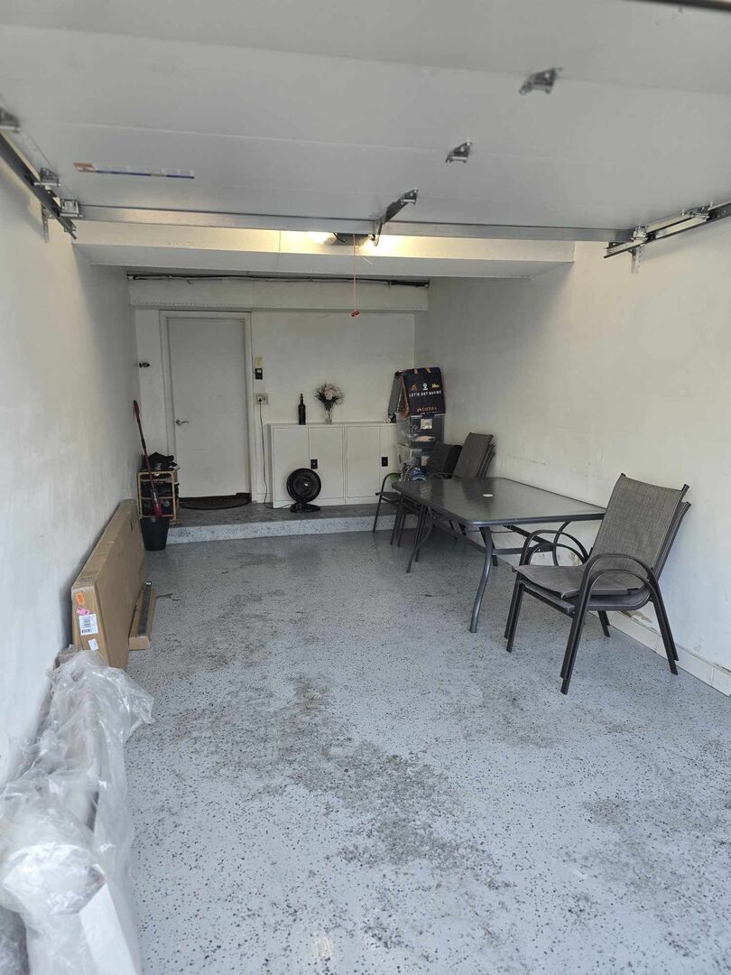 877 Wellington Avenue, Unit 1 Elk Grove Village, IL 60007 - Photo 23 of 25 a view of a room with gym equipment