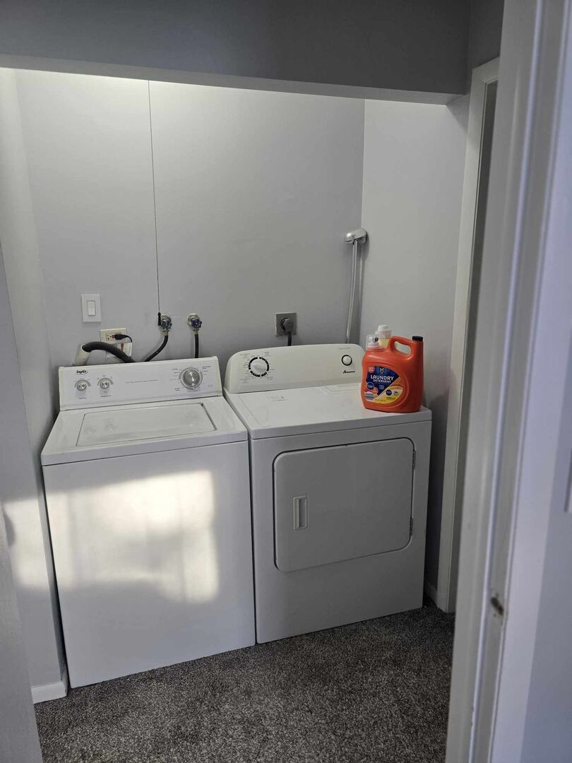 877 Wellington Avenue, Unit 1 Elk Grove Village, IL 60007 - Photo 25 of 25 a utility room with dryer and washer