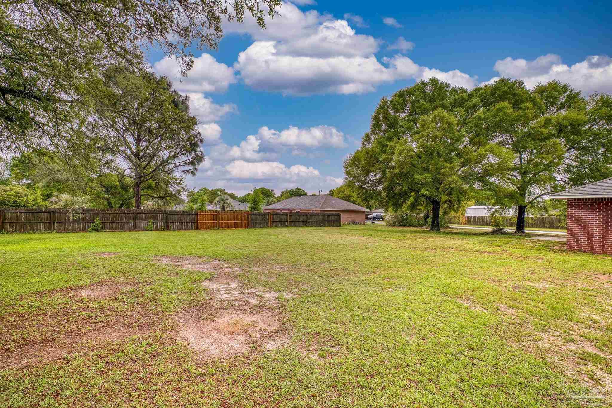 5564 Paddle Wheel Drive Milton, FL 32583 - Photo 29 of 41 a view of swimming pool is middle in the garden